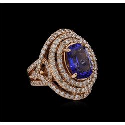 14KT Rose Gold 6.83ct Tanzanite and Diamond Ring