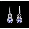 Image 1 : 1.37ctw Tanzanite and Diamond Earrings - 14KT White Gold