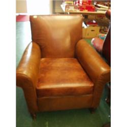 Brown leather armchair…