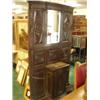 Image 1 : Oak hall stand with bevelled mirror centre…