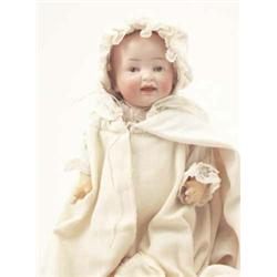 A bisque doll, probably Gebruder Heubach, early 20th century, the solid head with painted hair an...