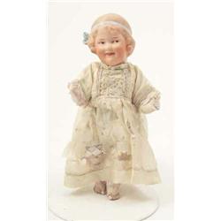 A German moulded head bisque doll, with jointed composition body, 9 ins....