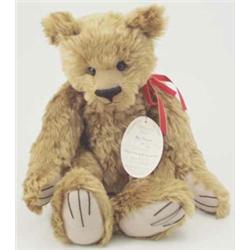 A 'Somewhere in time' collectors teddy bear, 'Edwin', in golden mohair with glass eyes and growle...