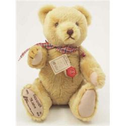 A modern Hermann golden plush teddy bear, with glass eyes and growler, no 1886/2000, 18ins...