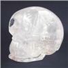 Image 1 : A white quartz crystal skull with carved and part polished features 6.5ins high...