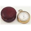 Image 1 : A late Victorian pocket aneroid compensated barometer, in gilt metal case by John Barker & Co of...
