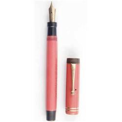 A Parker Lucky Curve Senior, in red with twin cap bands, engraved (1)...