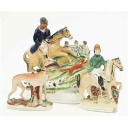 Three Victorian Staffordshire pottery groups, huntsman and hounds, 9.75ins, rider on horseback, 7...