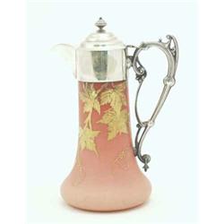 A Victorian pink glass claret jug, possibly Webb's Burmese, gilded with leaves and fitted with pl...