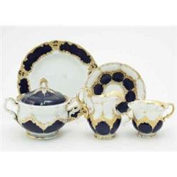 A Meissen 16-piece part teaset, comprising six cups and saucers, covered slop bowl, milk jug and...