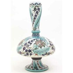 A Cantagalli majolica vase, of early Eastern shape, painted with flowers predominantly in blue an...