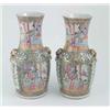 Image 1 : A pair of 19th century Canton baluster vases, with twin gilt handles, painted with figures at var...