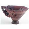 Image 1 : A Chinese rhinoceros horn libation cup, the sides carved in relief with a stylised band of lotus,...