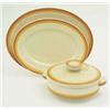 Image 1 : A Clarice Cliff circular tureen and cover, and two oval serving plates en suite, painted with ora...