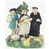 Image 1 : A late 18th century Staffordshire Tithe Pig figure group, parson alongside parents and child, bas...