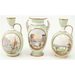 An early 19th century bone china garniture, consisting of a pair of oval jugs and a twin-handled...