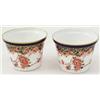 Image 1 : A pair of Royal Crown Derby flowerpots, printed with foliage in iron red against gilded blue bord...