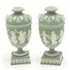 Image 1 : A pair of Wedgwood green jasperware vases, decorated with dancing nymphs in a neo-classical style...