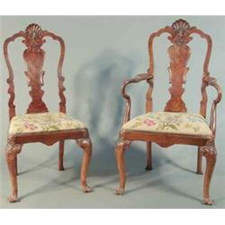 A good set of eight Queen Anne design walnut dining chairs, including two with arms with deeply c...