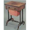 Image 1 : An early Victorian rosewood writing/work table, with leather lined folding top, frieze drawer and...