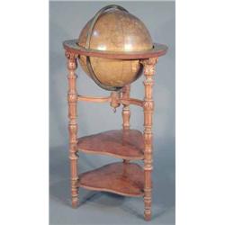 A Victorian terrestrial globe, by Smith & Son 63 Charing Cross with brass latitude ring and celes...
