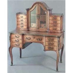 A 19th century kingwood and rosewood cross banded bonheur du jour, with arched glazed two-door su...