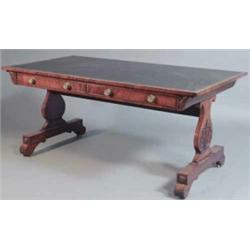 A Regency mahogany library table, with brown skiver and two real and two dummy drawers on lyre sh...