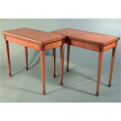 A pair of Edwardian satinwood and crossbanded rectangular card tables, on four square tapered leg...