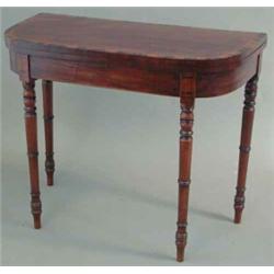 A Regency mahogany 'D' shape card table, with coromandel crossbanding on turned tapered legs, 2ft...