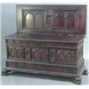 Image 1 : A late 17th century/early 18th century Spanish oak coffer, the rising lid carved on the underside...