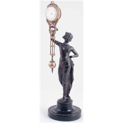A late 19th century French bronzed spelter 'mystery' clock, in the form of a young female holding...
