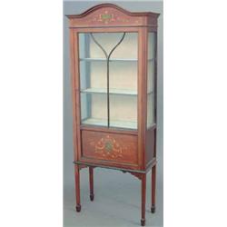 An Edwardian mahogany single door display cabinet, with string inlay and painted decoration on sq...