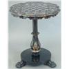 Image 1 : A Victorian papier-mache and ebonised games table, the pie crust circular top painted and shell i...