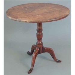 A George III oak circular top occasional table, on vase stem and tripod, 2ft 6ins...