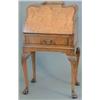 Image 1 : A figured walnut bureau de dame, with slant and drawer on cabriole legs with hairy claw feet, 2ft...