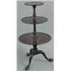 Image 1 : A George III mahogany 3-tier circular dumb waiter, with tapered and spiral fluted columns and tri...
