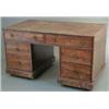 Image 1 : A Regency rosewood desk, of pedestal form with tan skiver and two long and four short drawers fit...