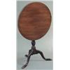 Image 1 : A George III mahogany circular occasional table, on tapered stem with spiral fluted knop and swep...