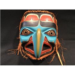 EAGLE  MASK BY COAST SALISH ARTIST RANDY STIGLITZ, MASK ADORNED WITH BRAIDED CEDAR BARK HAIR