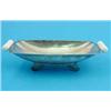 Image 1 : An Art Deco silver fruit bowl, of curved rectangular form with white plastic bar handles and scro...