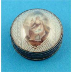 A George III silver patch box, of circular form, the lid inset with a miniature of a lady beneath...