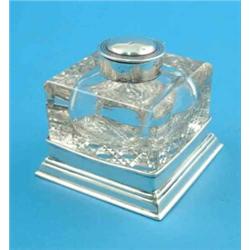 A George V silver mounted square glass inkwell....