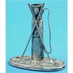 A George V novelty silver hatpin stand, modelled as a caddy and two golf clubs, Chester 1913, 3.5...