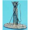 Image 1 : A George V novelty silver hatpin stand, modelled as a caddy and two golf clubs, Chester 1913, 3.5...