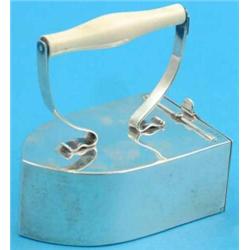 An Edwardian silver playing card box modelled as an iron, with ivory handle, 1901, 4ins....