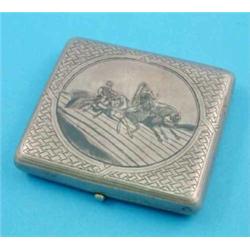 A Russian 84 zolotnik and niello cigarette case, decorated with a troika, 1892, 3.5ins....