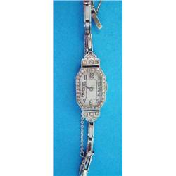A 1930'S diamond set platinum cocktail watch, with arabic dial....