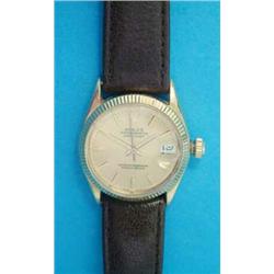 A lady's 18ct gold Rolex Oyster Perpetual Datejust wrist watch, on brown leather strap...