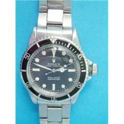 A gentleman's Rolex Oyster Perpetual Submariner wrist watch, with steel bracelet....