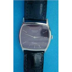 A gentleman's 18ct white gold Rolex Cellini wrist watch, with baton numerals and brown dial....
